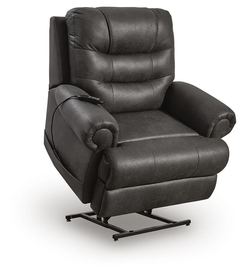 Ashley Furniture power lift recliner in beige fabric, showing the reclined position with armrests and control panel visible.