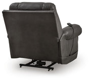 Ashley Furniture power lift recliner in beige fabric with padded armrests and a plush backrest, designed for comfort and support.