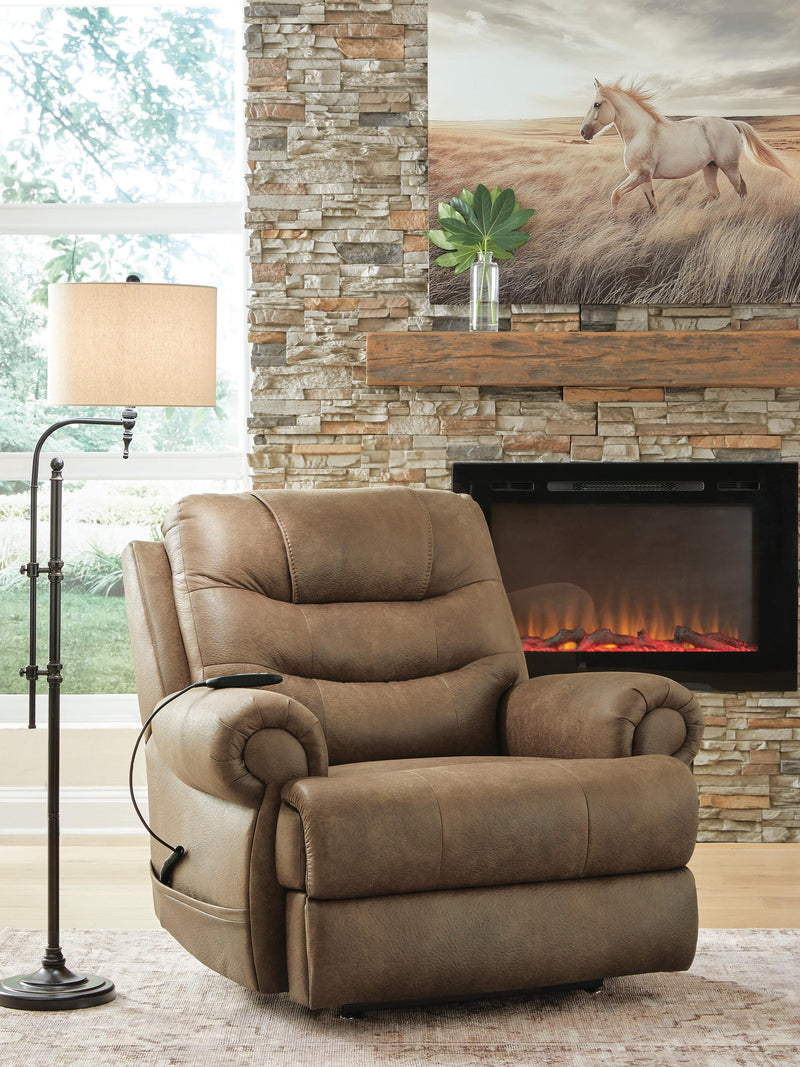 Ashley Furniture power lift recliner in beige fabric, showing a side view with the reclined back and footrest extended.