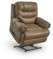 Ashley Furniture power lift recliner in beige fabric, showing the reclined position with padded armrests and backrest.