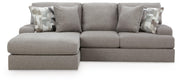 Ashley Furniture Lindon sectional with chaise, showing plush fabric upholstery and modern design in a spacious living room setting.