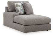 Ashley Furniture Lindon sectional with chaise, showing a modern fabric sectional sofa with angled view in a living room setting.