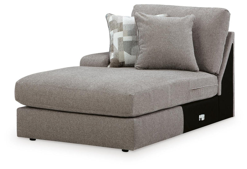 Ashley Furniture Lindon sectional with chaise, showing a modern fabric sofa in a stylish living room setting.