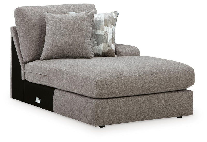 Ashley Furniture Lindon sectional with chaise, featuring plush cushions and modern design, shown from an angled view.