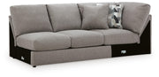 Ashley Furniture Lindon sectional with chaise, featuring plush upholstery and modern design, shown from an angled side view.