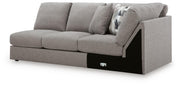Ashley Furniture Lindon sectional with chaise, showing a modern upholstered sectional sofa with plush cushions and a coordinated chaise lounge.
