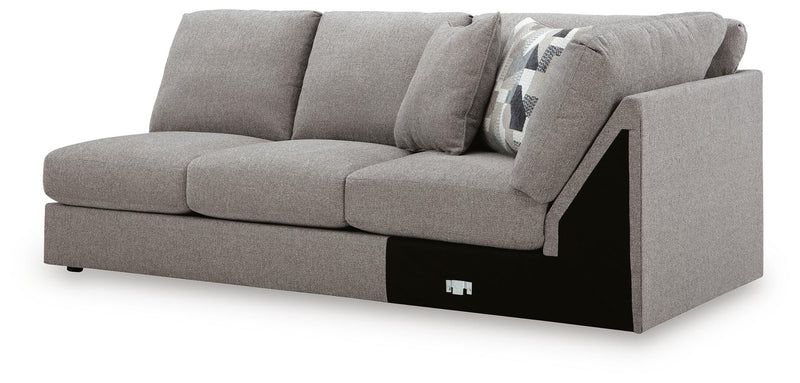 Ashley Furniture Lindon sectional with chaise, showing a modern upholstered sectional sofa with plush cushions and a coordinated chaise lounge.