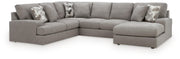 Ashley Furniture Lindon sectional with chaise in neutral fabric, showing plush cushions and modern design in a living room setting.