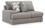 Ashley Furniture Lindon sectional with chaise, featuring plush fabric, modern design, and multiple seating options.