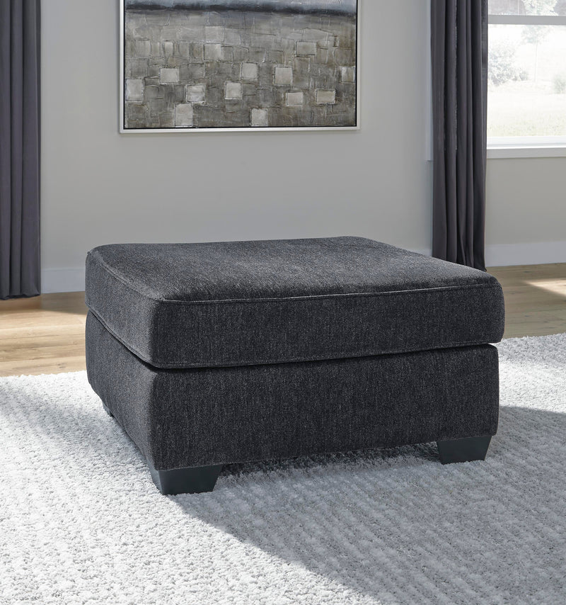 Ashley Furniture Altari living room set with plush sofa and armchairs, stylish upholstery, and wooden legs in a modern design.