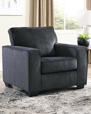 Ashley Furniture Altari Chair with cushioned fabric upholstery and wooden legs, featuring a modern design and neutral color.
