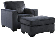 Ashley Furniture Altari living room set with sofa and armchair, featuring neutral upholstery and modern design.