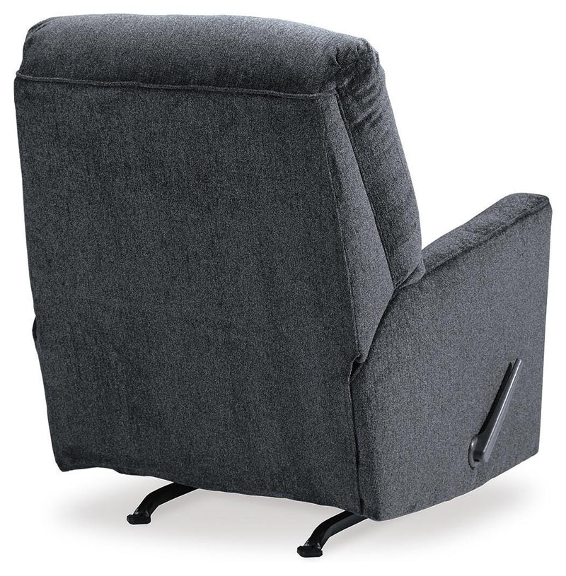 Ashley Furniture Altari recliner with plush upholstery and padded armrests, shown from the back in a modern living room setting.