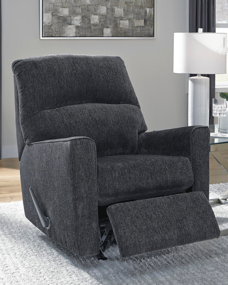 Open Ashley Furniture Altari recliner showing plush fabric upholstery and padded armrests in a cozy living room setting.