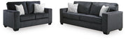 Ashley Furniture Altari living room set with sofa and chairs, featuring plush upholstery and modern design.