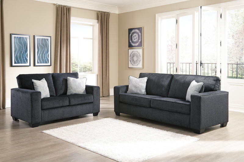 Ashley Furniture Altari living room set featuring a plush sofa and matching chairs in a contemporary design.