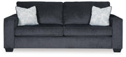 Ashley Furniture Altari living room set with plush sofa and matching chairs in a modern design, shown in a stylish living room.