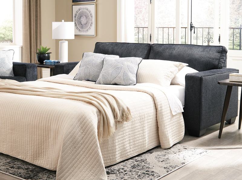 Ashley Furniture Altari sofa sleeper with plush fabric, featuring a convertible design and comfortable seating in a modern living room setting.