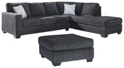Ashley Furniture Altari living room set with sofa and armchair in a modern design, featuring neutral upholstery and wooden legs.