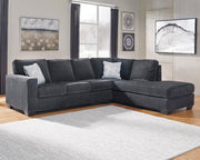 Ashley Furniture Altari sectional with chaise, featuring plush fabric upholstery and modern design, shown in a cozy living room setting.