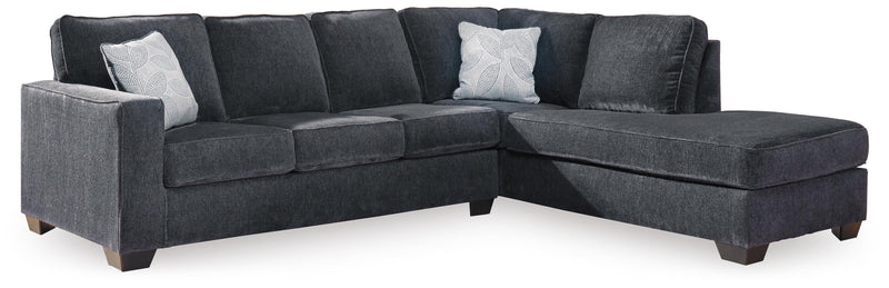Ashley Furniture Altari living room set with sofa, loveseat, and armchair in a modern design arranged in a cozy living space