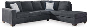 Ashley Furniture Altari sectional with chaise, showing plush fabric upholstery and modern design in a spacious living room setting.