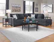 Ashley Furniture Altari sectional with chaise, showing a modern fabric sofa with plush cushions and a spacious seating arrangement.