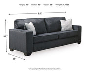 Ashley Furniture Altari living room set with plush sofa, matching armchair, and coordinated coffee table in a modern design.