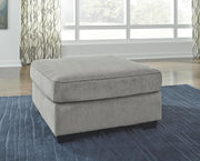 Ashley Furniture Altari living room set with sofa and armchair, featuring neutral upholstery and modern design.