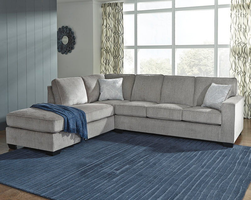 Ashley Furniture Altari sectional with chaise, beige fabric, modern design, includes multiple seating sections and a comfortable chaise lounge.