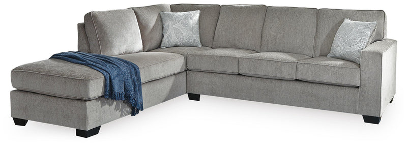 Ashley Furniture Altari sectional with chaise, showing plush fabric upholstery and modern sectional design in a living room setting.