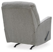 Ashley Furniture Altari recliner with plush fabric upholstery and padded armrests, shown in a cozy living room setting.