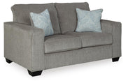 Ashley Furniture Altari loveseat shown from an angle, featuring plush fabric upholstery and comfortable seating for two.