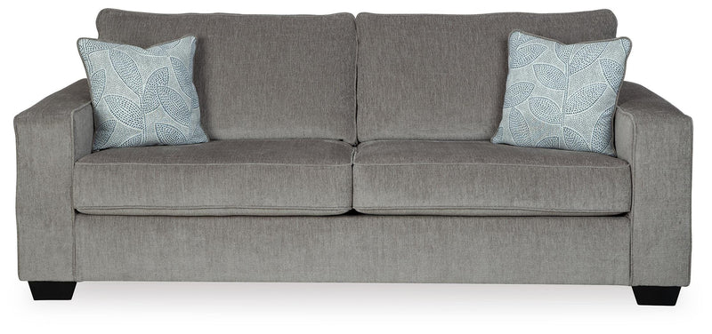 Ashley Furniture Altari Sofa Sleeper with beige fabric, showing a close-up of the sofa's head and backrest in a modern living room setting.