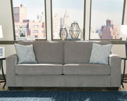 Ashley Furniture Altari living room set featuring a sofa, loveseat, and coffee table in a modern design.