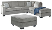 Ashley Furniture Altari living room set with plush sofa and matching armchair, beige upholstery and modern design.