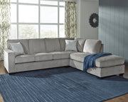 Ashley Furniture Altari sectional with chaise, showing plush fabric upholstery and modern design in a spacious living room setting.