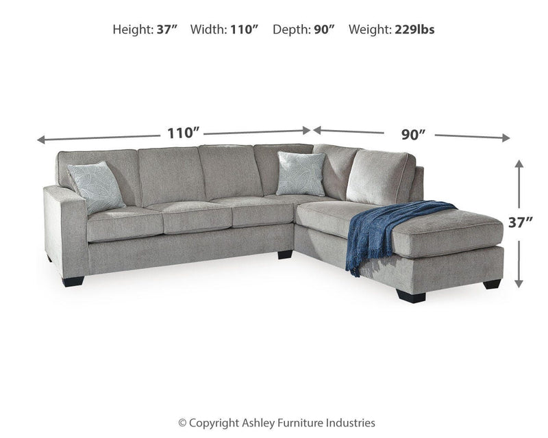 Ashley Furniture Altari sectional with chaise, featuring plush upholstery and modern design, shown in a spacious living room setting.