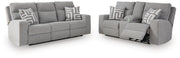 Ashley Furniture Biscoe living room set with sofa and armchair in a modern design, featuring neutral upholstery and plush cushions.