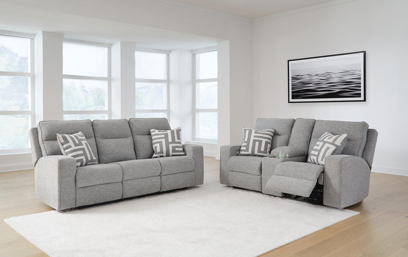 Ashley Furniture Biscoe living room set with beige upholstered sofa and armchair, featuring plush cushions and wooden legs.