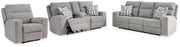 Ashley Furniture Biscoe living room set with sofa and armchair in a modern design, featuring neutral upholstery and wooden accents.