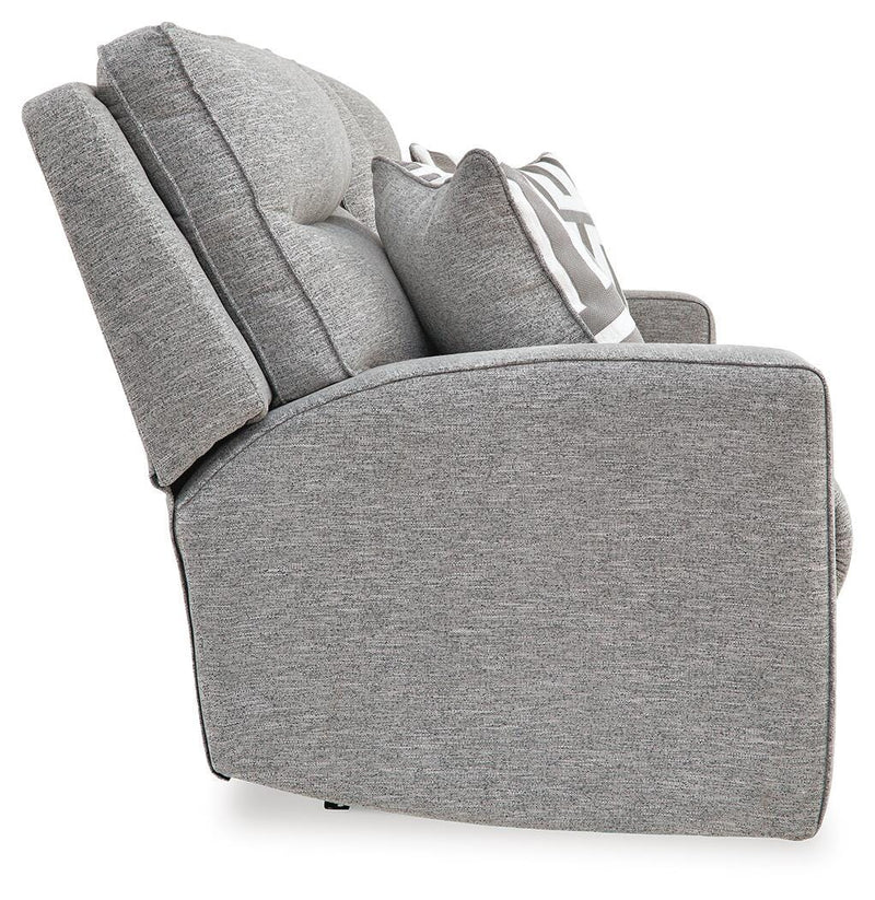 Ashley Furniture Biscoe living room set with a sofa and armchair, featuring neutral fabric upholstery and wooden legs.