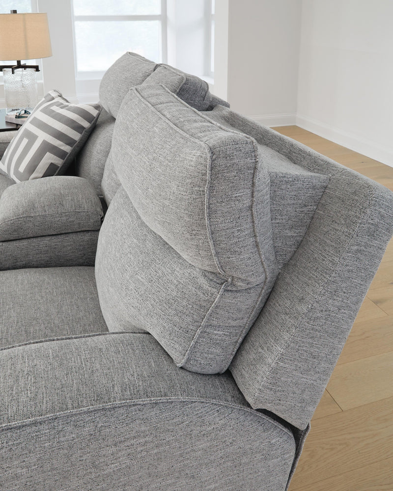 Ashley Furniture Biscoe power reclining loveseat with plush cushions and dark upholstery, perfect for comfortable living room seating.