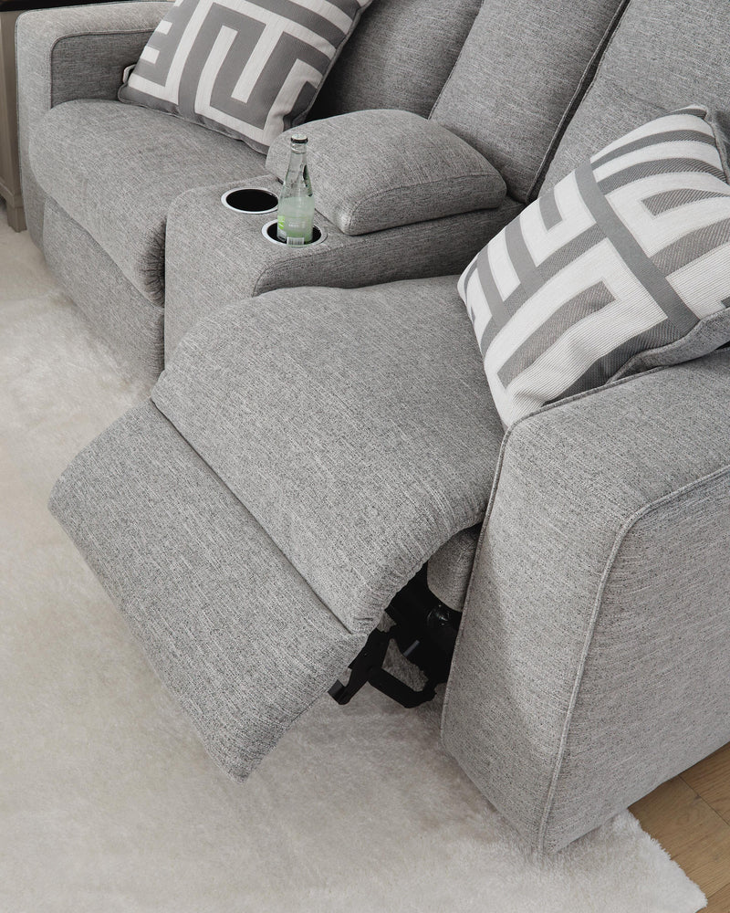 Ashley Furniture Biscoe Power Reclining Loveseat with plush cushions and reclining features in a modern living room setting.