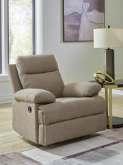 Ashley Furniture Side-Swipe Recliner in soft fabric with padded armrests and plush cushioning, shown from a side angle.