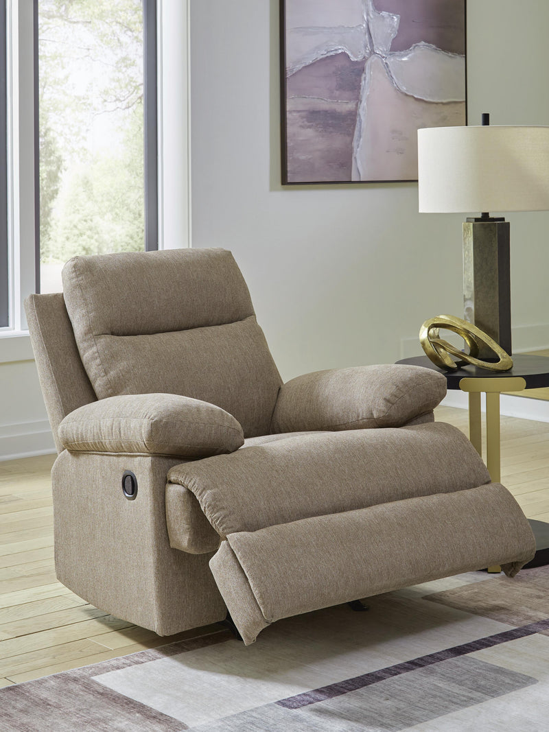 Open Ashley Furniture Side-Swipe Recliner showing plush fabric upholstery and reclining mechanism in a modern living room setting.