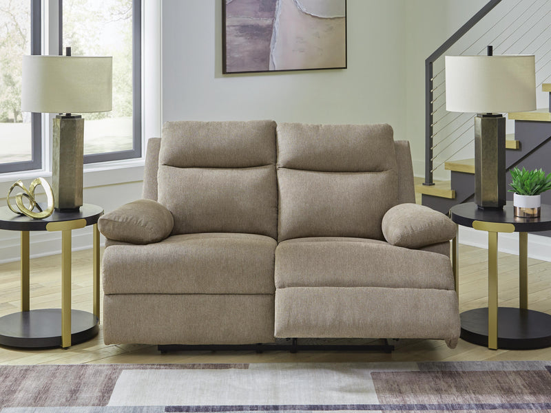 Ashley Furniture side-swipe reclining loveseat with plush cushions and modern design, shown in a cozy living room setting.