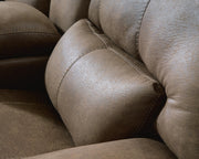 Ashley Furniture Beckley Place power reclining sofa with plush cushions and lumbar support, showing detailed close-up of lumbar area.