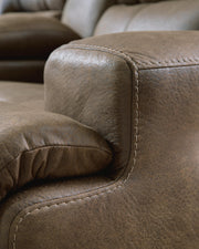 Ashley Furniture Beckley Place power reclining loveseat with console, featuring stitched upholstery and plush seating.
