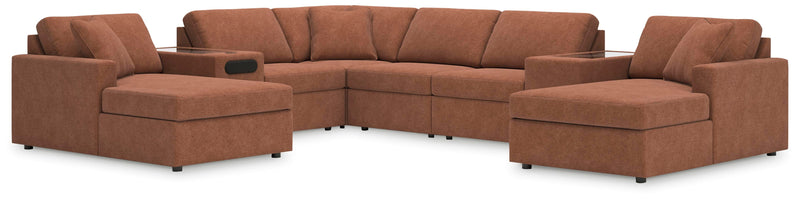 Ashley Furniture Modmax sectional with chaise, featuring plush upholstery and modern design, shown in a cozy living room setting.